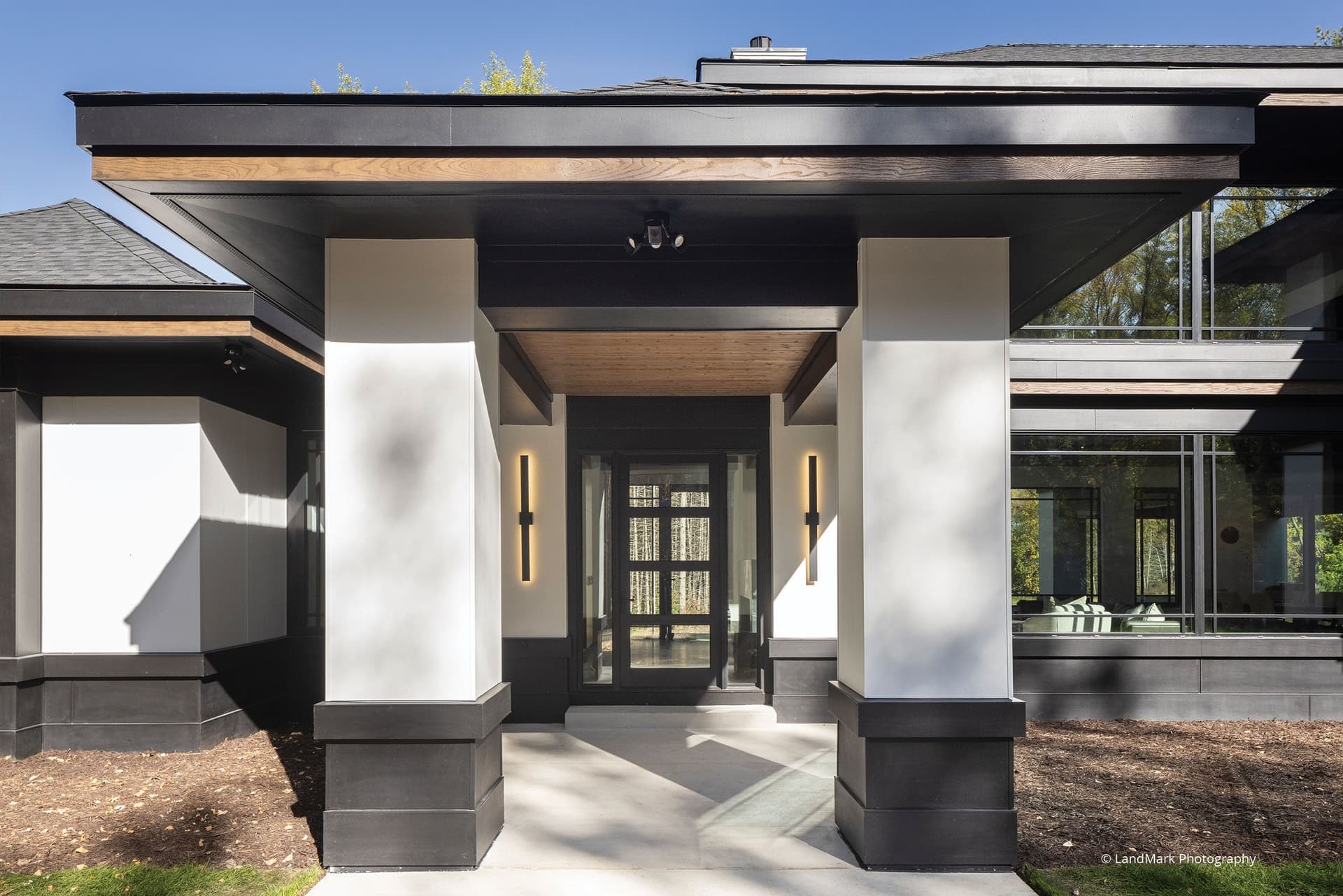 VistaLuxe AL LINE direct sets and casements;Ultra Series swinging door with sidelites finished in Onyx to match