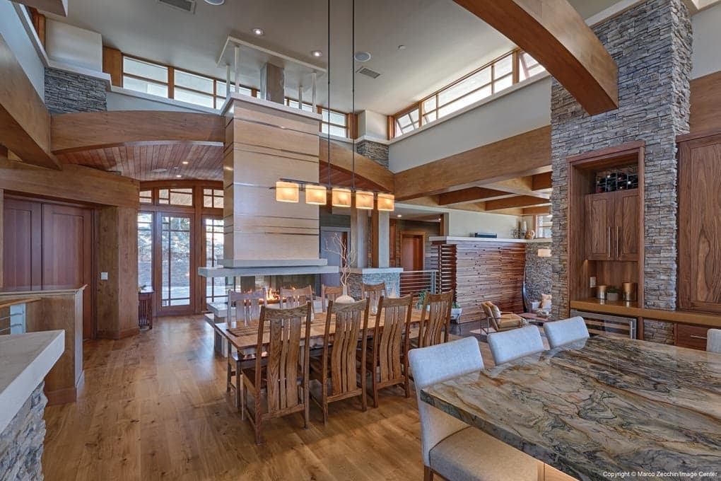 wood door with custom red performance divided lites in a redwood barrel vaulted entrance.