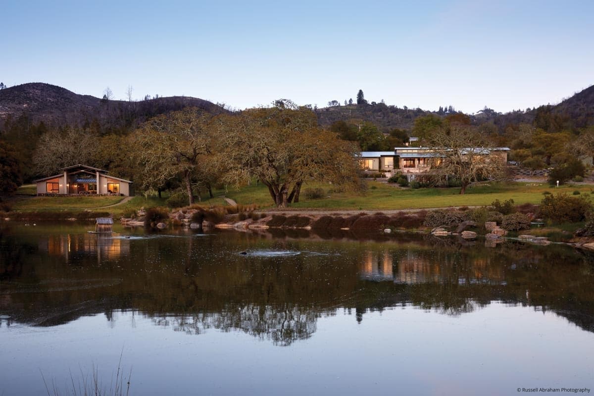AM210 - rear view of guest house and main house with VistaLuxe WD windows and doors